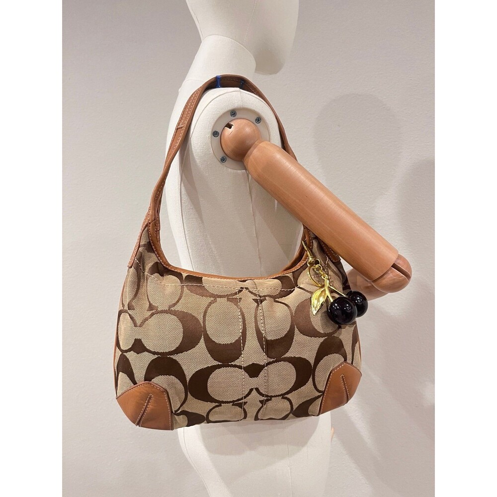 COACH SIGNATURE SMALL ERGO CANVAS BAG.